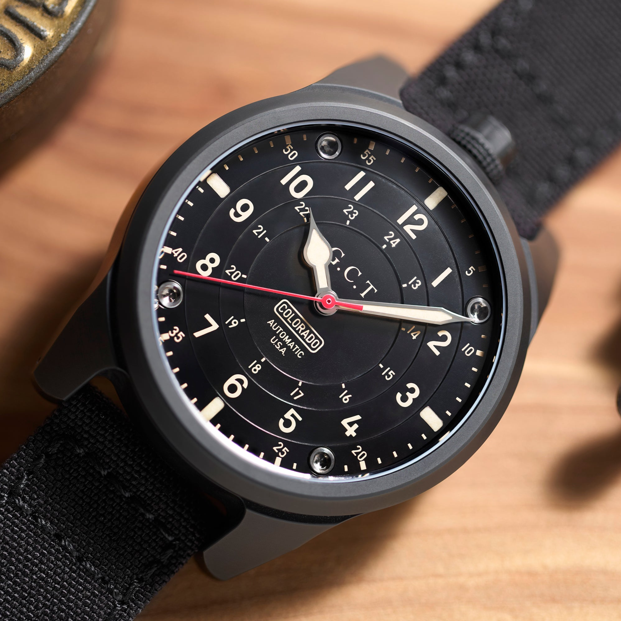 The GCT - DLC Black Case - Machined Dial