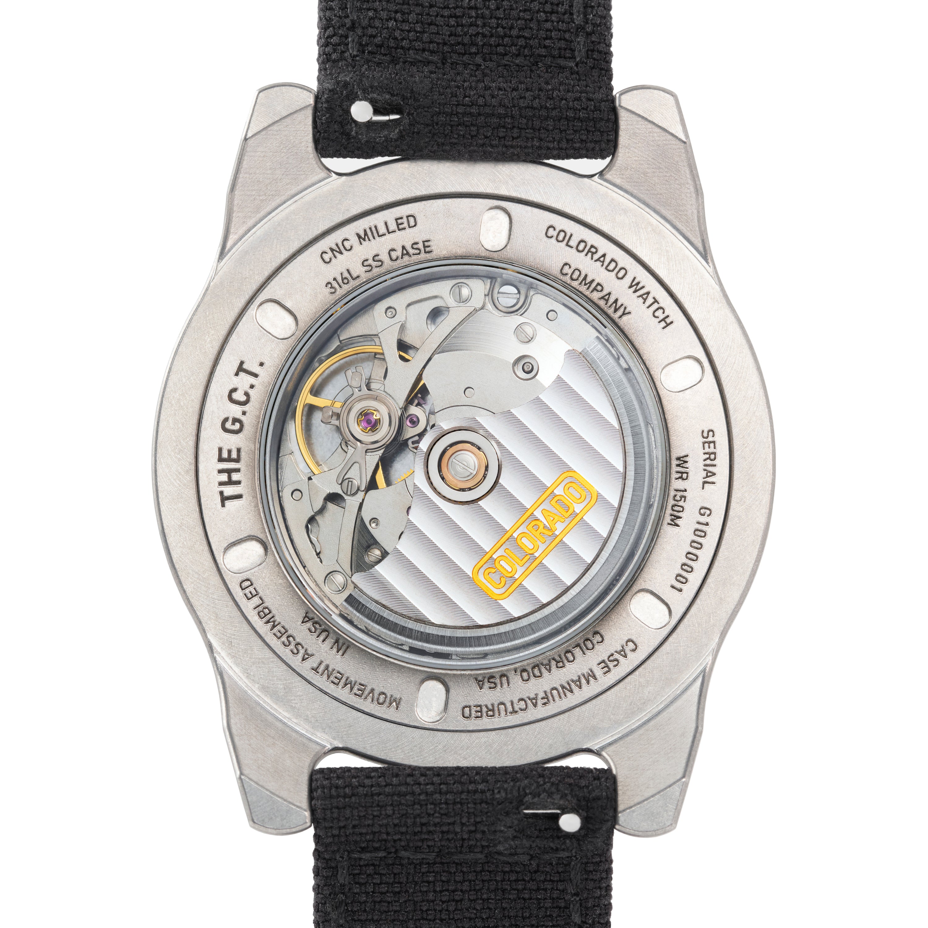 Back view of a watch with visible mechanism and branding.